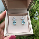 Brinco Flor com Pingente Cristal Azul | BELLORIE