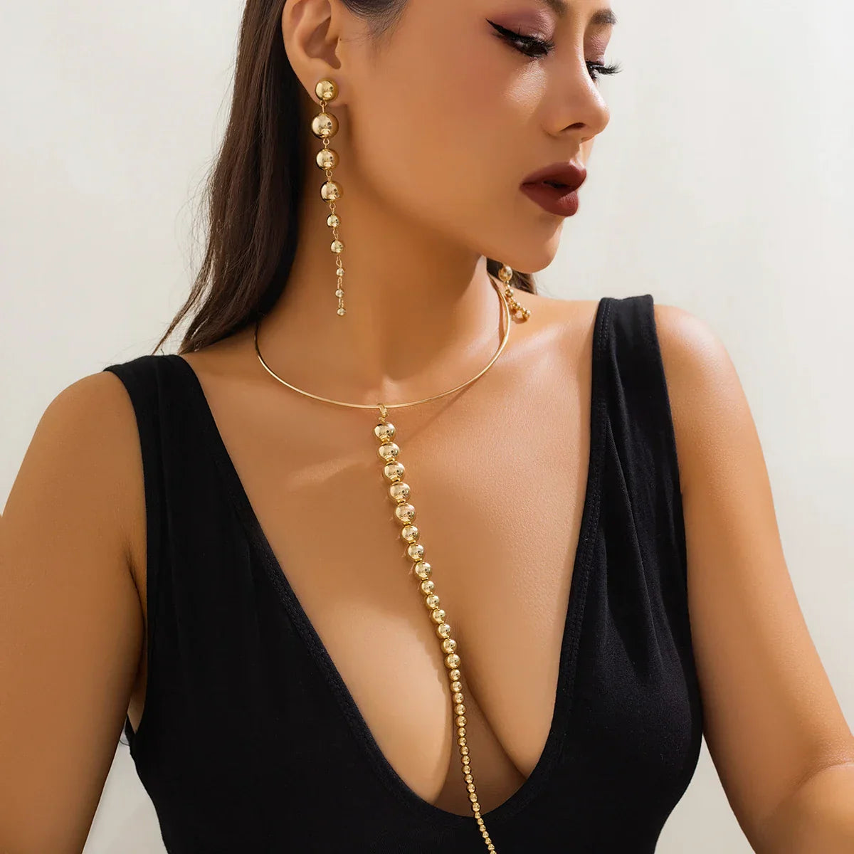 Conjunto Colar e Brincos Longos de bolas Douradas | BELLORIE