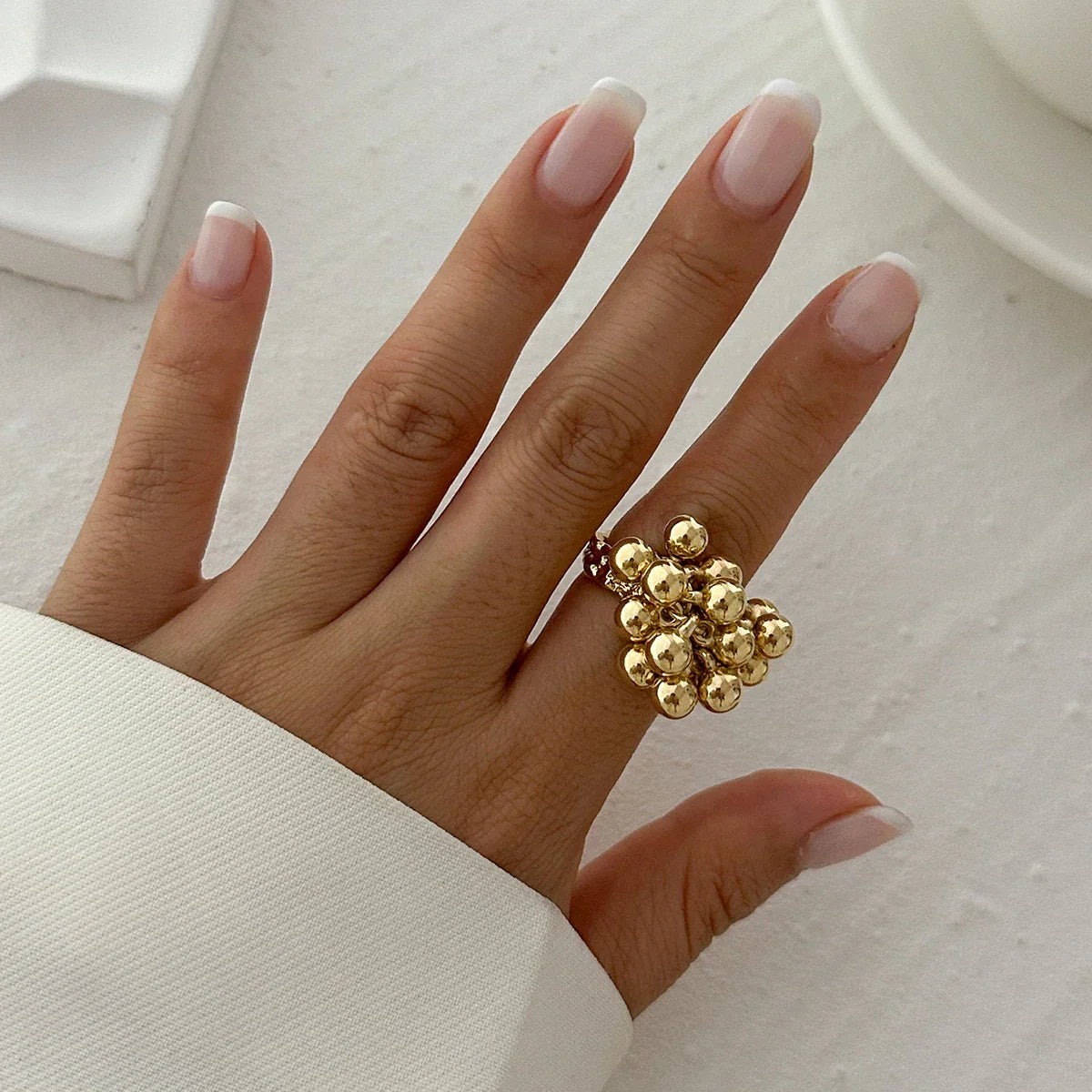 Anel Ajustável Dourado com Bolas | BELLORIE