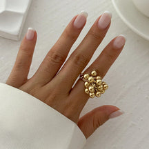Anel Ajustável Dourado com Bolas | BELLORIE