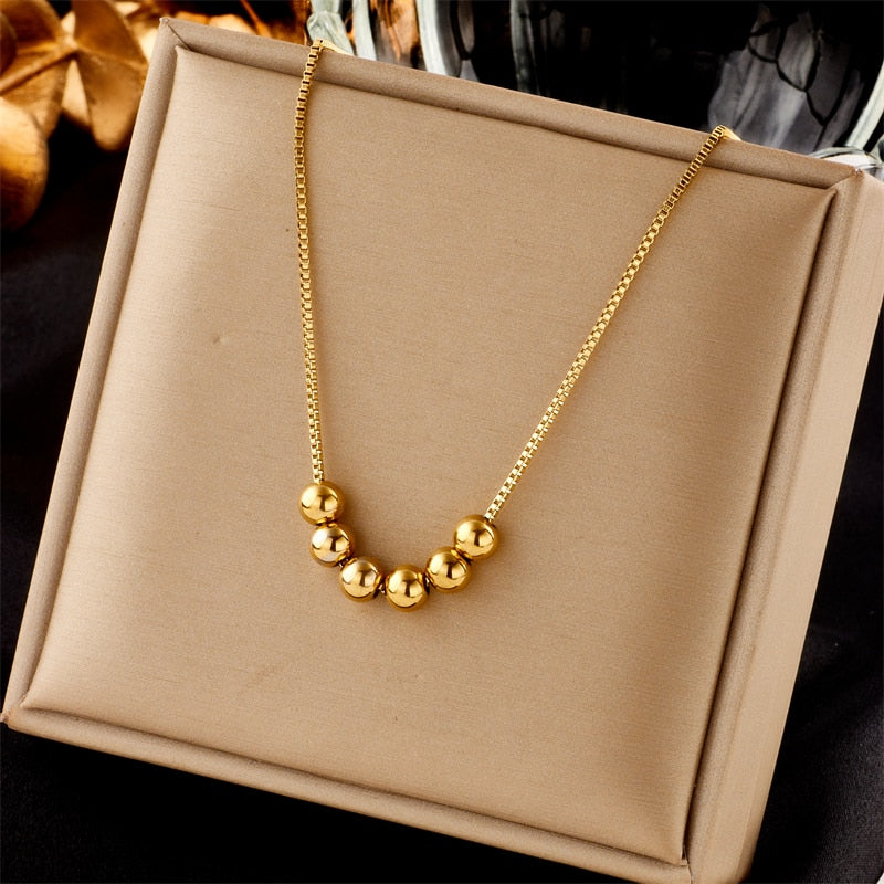 Colar Dourado com Pingente Bolas | BELLORIE