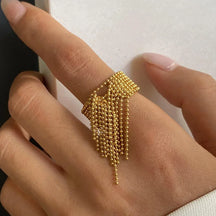 Anel Ajustável Dourado com Borla | BELLORIE